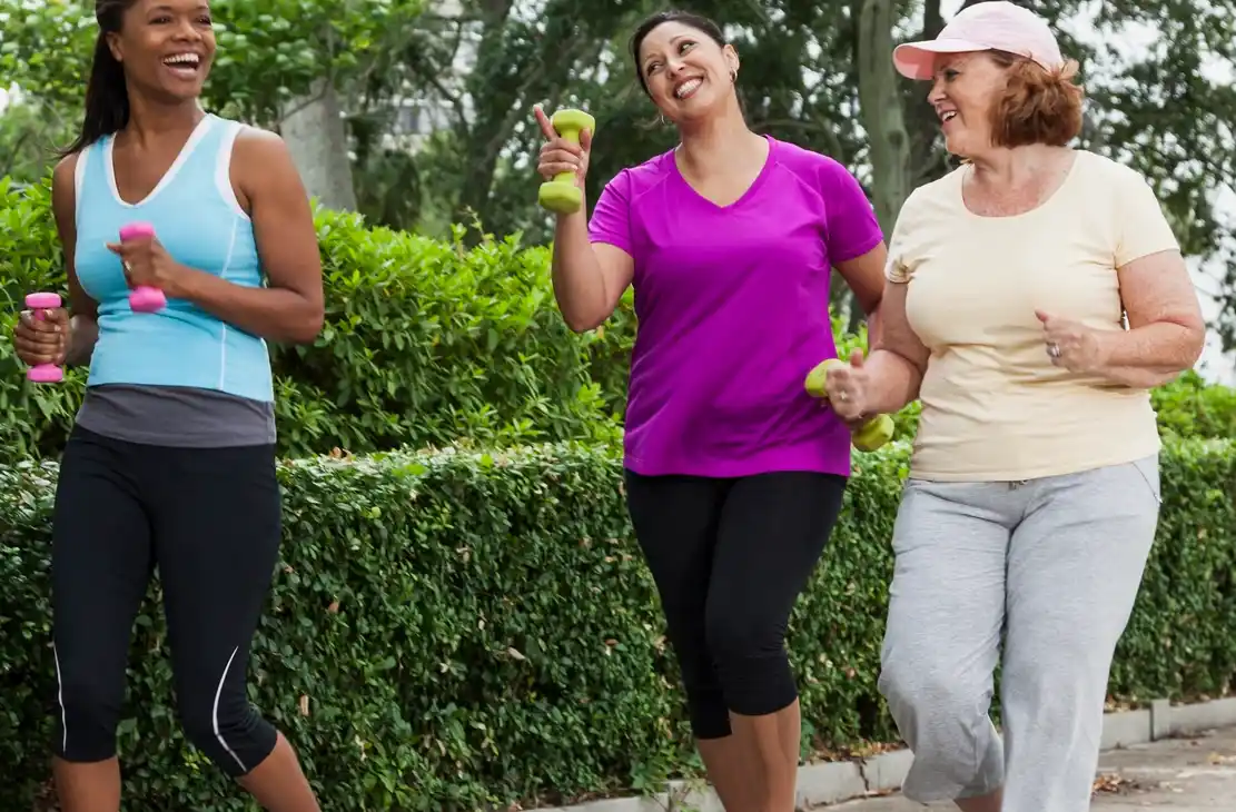Three women walking outdoors